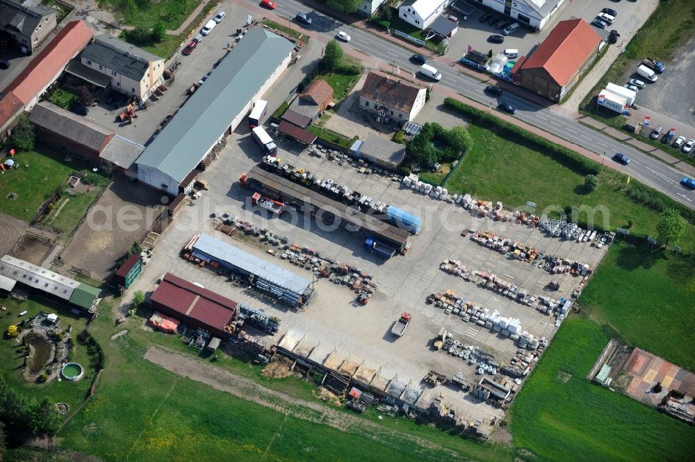 Schwanebeck from the bird's eye view: Material trading on the village road in the 16341 Panketal Schwanebeck