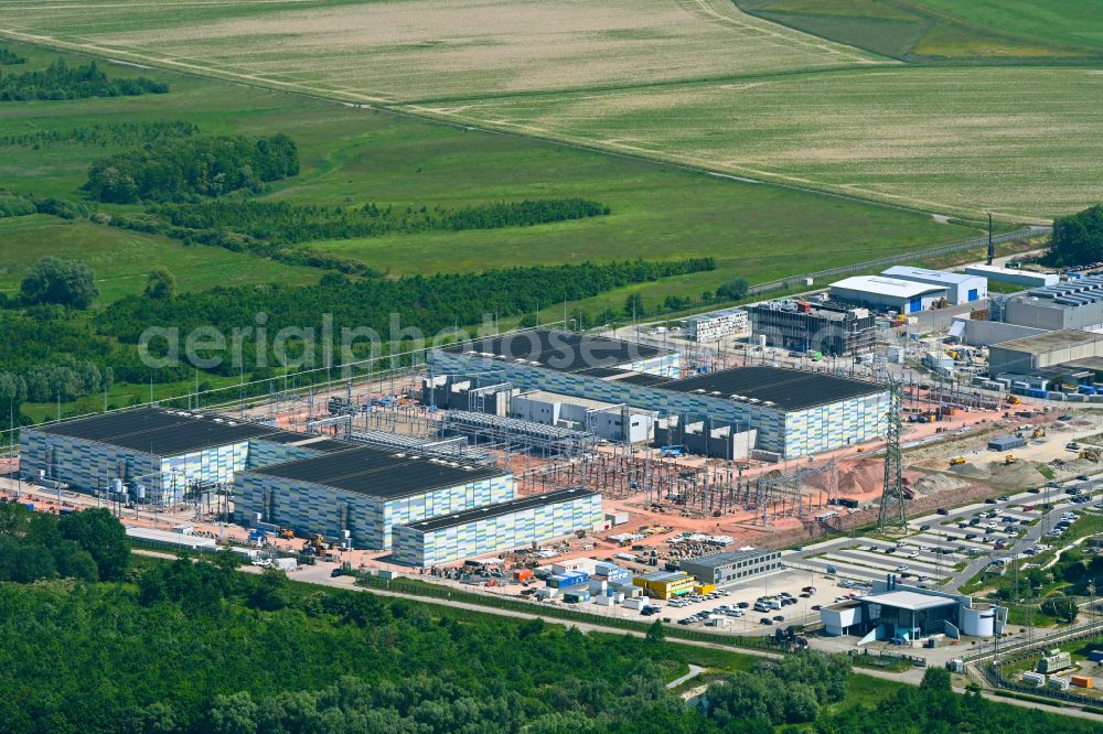 Philippsburg from the bird's eye view: Remains of the decommissioned reactor blocks and facilities of the nuclear power plant - KKW Kernkraftwerk EnBW Kernkraft GmbH, Philippsburg nuclear power plant and rubble of the two cooling towers at the shore of the Rhine river in Philippsburg in the state Baden-Wuerttemberg, Germany