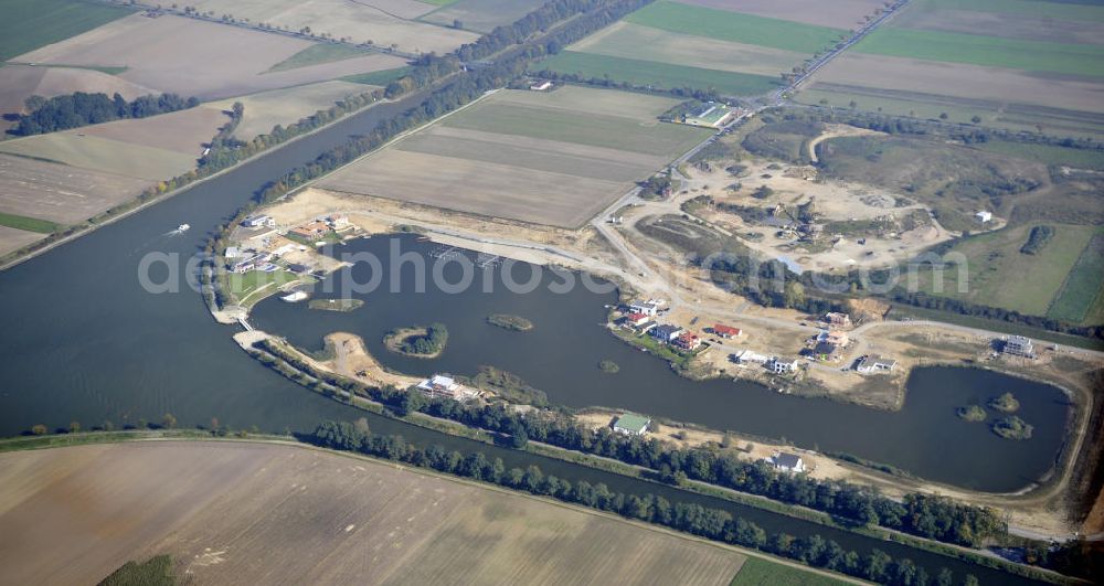 Bortfeld from the bird's eye view: Blick auf das Bauprojekt Marina Bortfeld nahe der Gemeinde Bortfeld im Landkreis Peine in Niedersachsen. Hier entsteht ein Wohngebiet mit Hafenanlage. View to the construction project Marina Bortfeld, near the small town Bortfeld in the administrative district Peine in Niedersachsen. Here is build an housing area with an harbour.