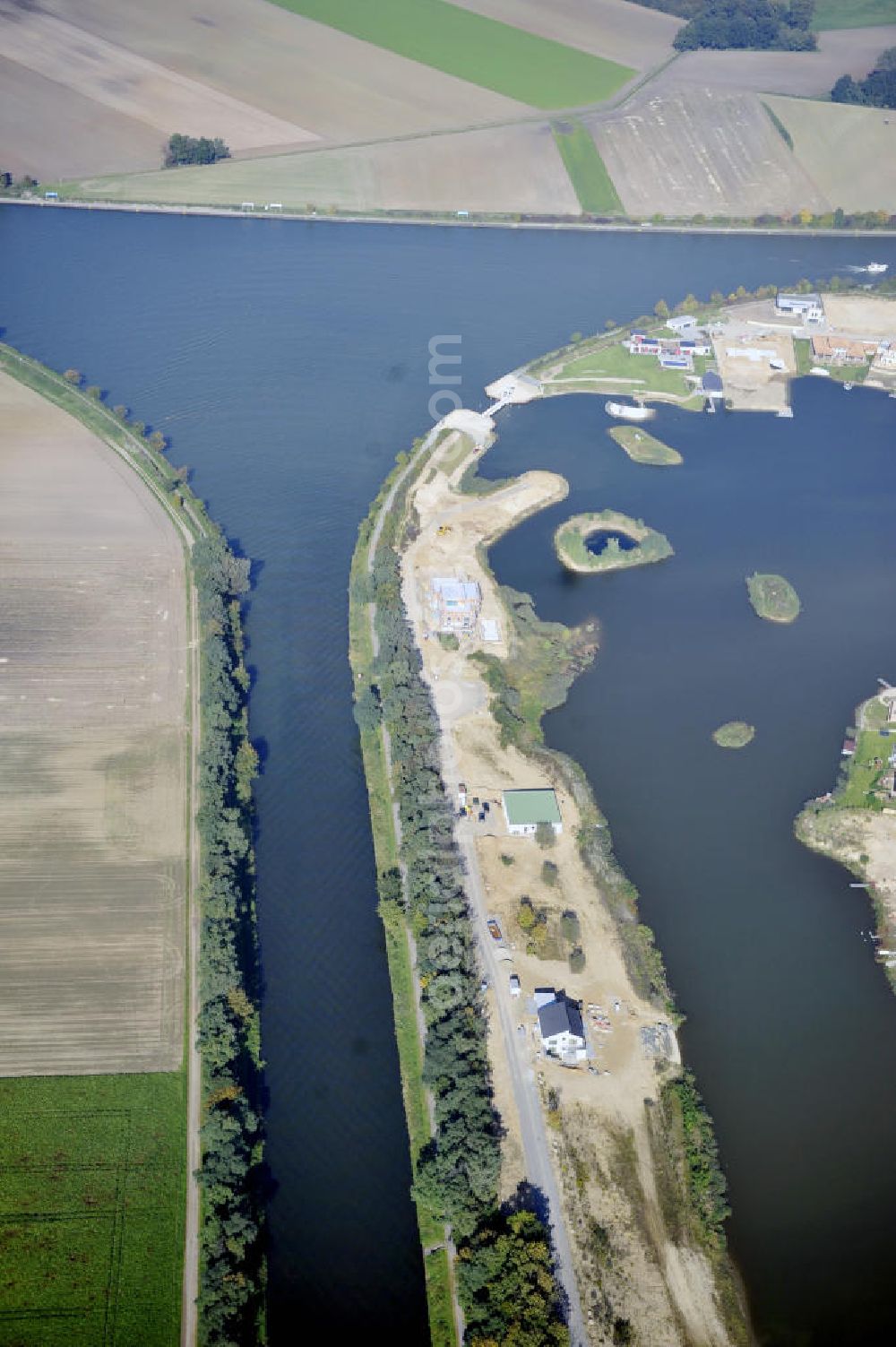 Bortfeld from above - Blick auf das Bauprojekt Marina Bortfeld nahe der Gemeinde Bortfeld im Landkreis Peine in Niedersachsen. Hier entsteht ein Wohngebiet mit Hafenanlage. View to the construction project Marina Bortfeld, near the small town Bortfeld in the administrative district Peine in Niedersachsen. Here is build an housing area with an harbour.