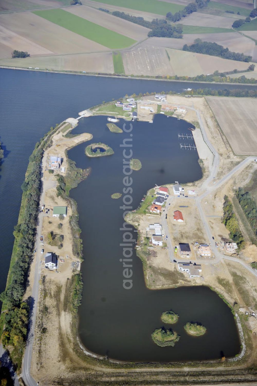 Bortfeld from the bird's eye view: Blick auf das Bauprojekt Marina Bortfeld nahe der Gemeinde Bortfeld im Landkreis Peine in Niedersachsen. Hier entsteht ein Wohngebiet mit Hafenanlage. View to the construction project Marina Bortfeld, near the small town Bortfeld in the administrative district Peine in Niedersachsen. Here is build an housing area with an harbour.