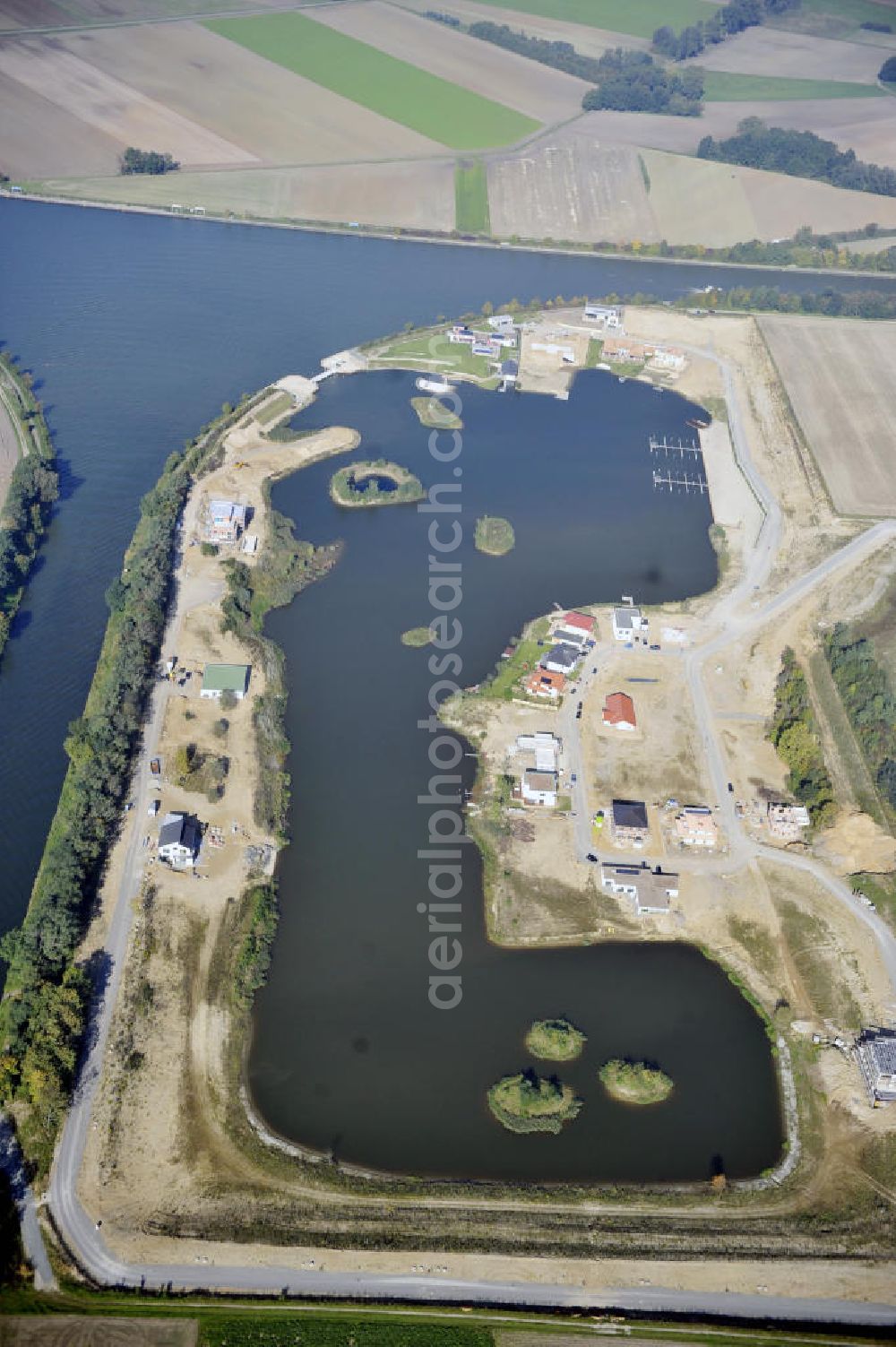 Aerial image Bortfeld - Blick auf das Bauprojekt Marina Bortfeld nahe der Gemeinde Bortfeld im Landkreis Peine in Niedersachsen. Hier entsteht ein Wohngebiet mit Hafenanlage. View to the construction project Marina Bortfeld, near the small town Bortfeld in the administrative district Peine in Niedersachsen. Here is build an housing area with an harbour.