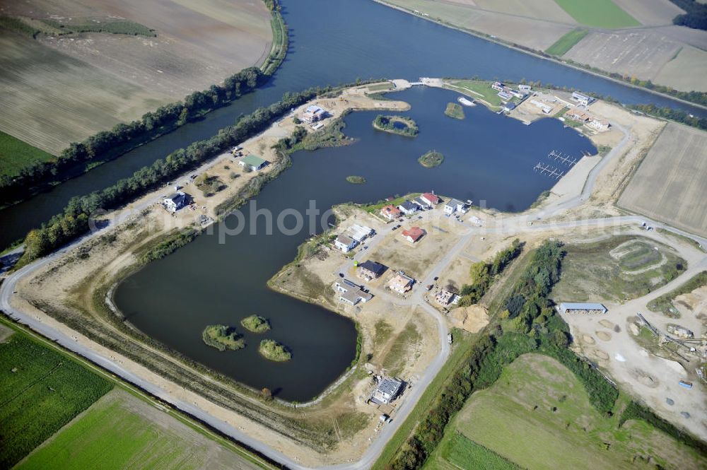 Bortfeld from the bird's eye view: Blick auf das Bauprojekt Marina Bortfeld nahe der Gemeinde Bortfeld im Landkreis Peine in Niedersachsen. Hier entsteht ein Wohngebiet mit Hafenanlage. View to the construction project Marina Bortfeld, near the small town Bortfeld in the administrative district Peine in Niedersachsen. Here is build an housing area with an harbour.