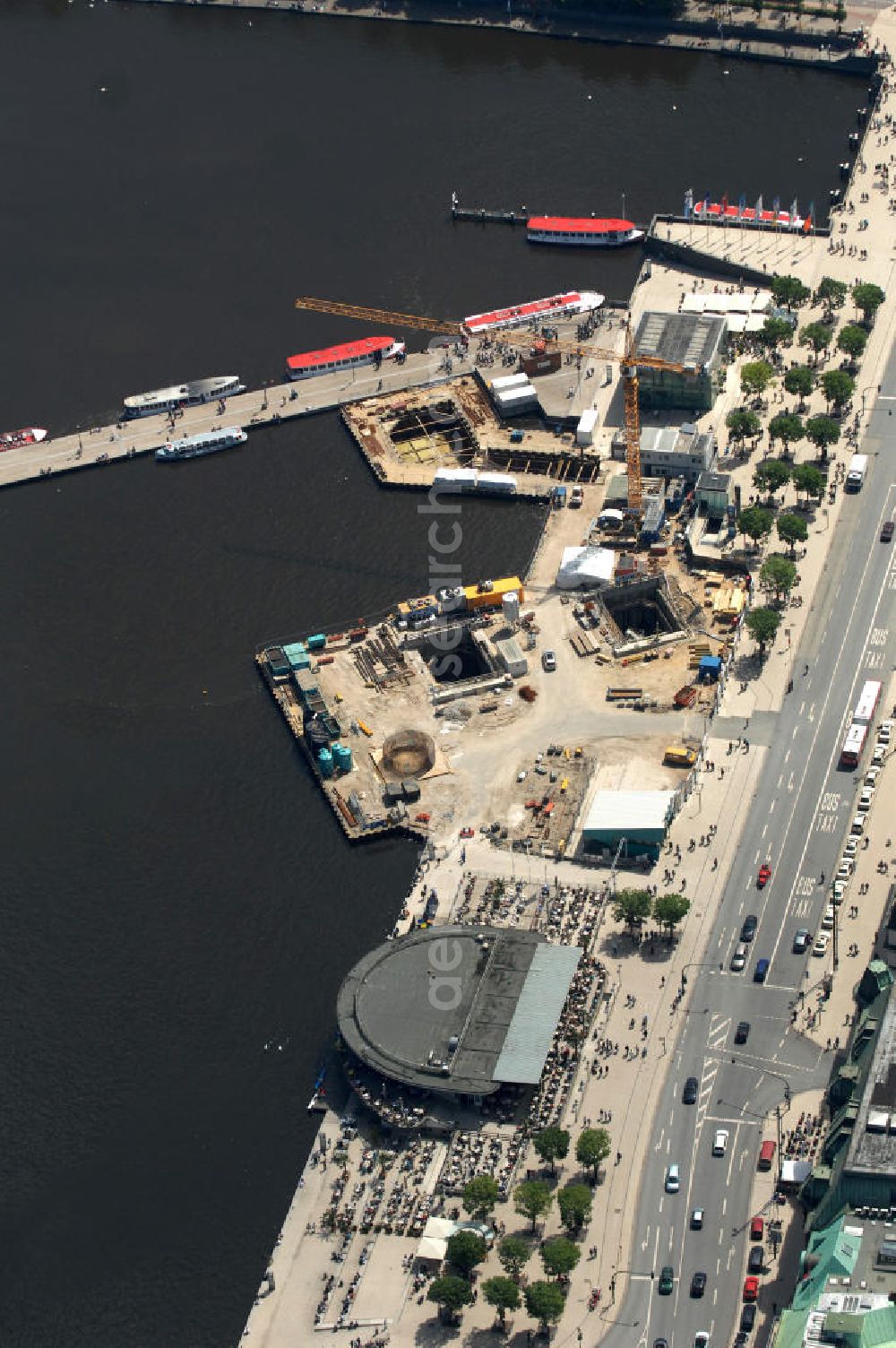 Hamburg from the bird's eye view: Construction site on the underground line 4 and the café in the Alsterpavilion at the street Jungfernsteig at the southern lakeside of the Inner Alster in Hamburg