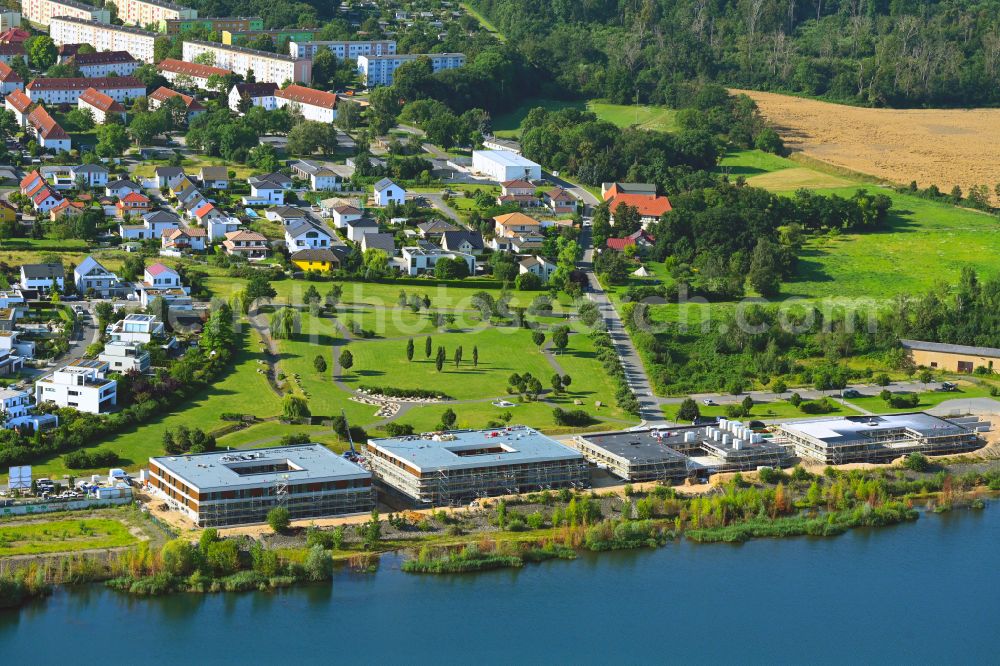 Aerial image Zwenkau - Construction site from the construction of a senior and age-appropriate residential complex aiutanda Lebenspark on Zwenkauer See on street Steife Brise in Zwenkau in the state Saxony, Germany