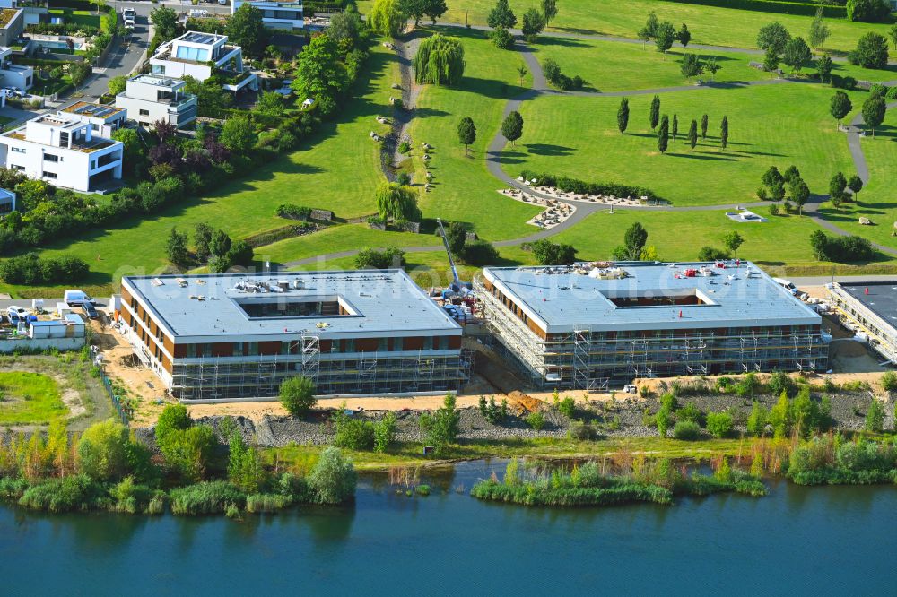 Aerial photograph Zwenkau - Construction site from the construction of a senior and age-appropriate residential complex aiutanda Lebenspark on Zwenkauer See on street Steife Brise in Zwenkau in the state Saxony, Germany