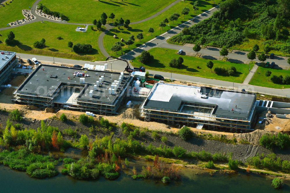 Zwenkau from the bird's eye view: Construction site from the construction of a senior and age-appropriate residential complex aiutanda Lebenspark on Zwenkauer See on street Steife Brise in Zwenkau in the state Saxony, Germany