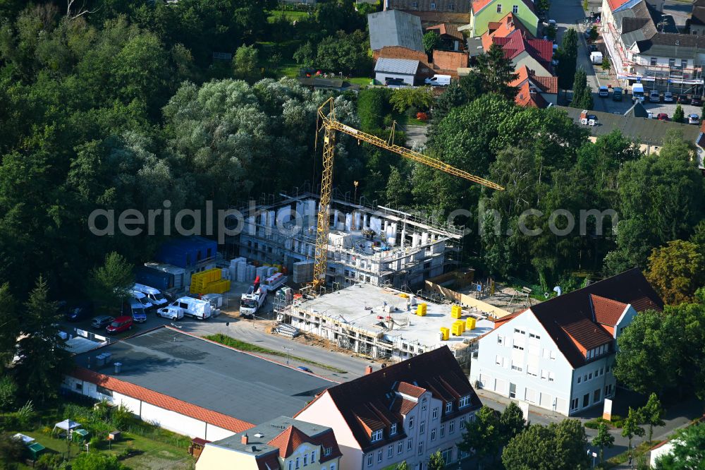 Aerial image Werneuchen - Construction site from the construction of a senior and age-appropriate residential complex on street Breite Strasse in Werneuchen in the state Brandenburg, Germany