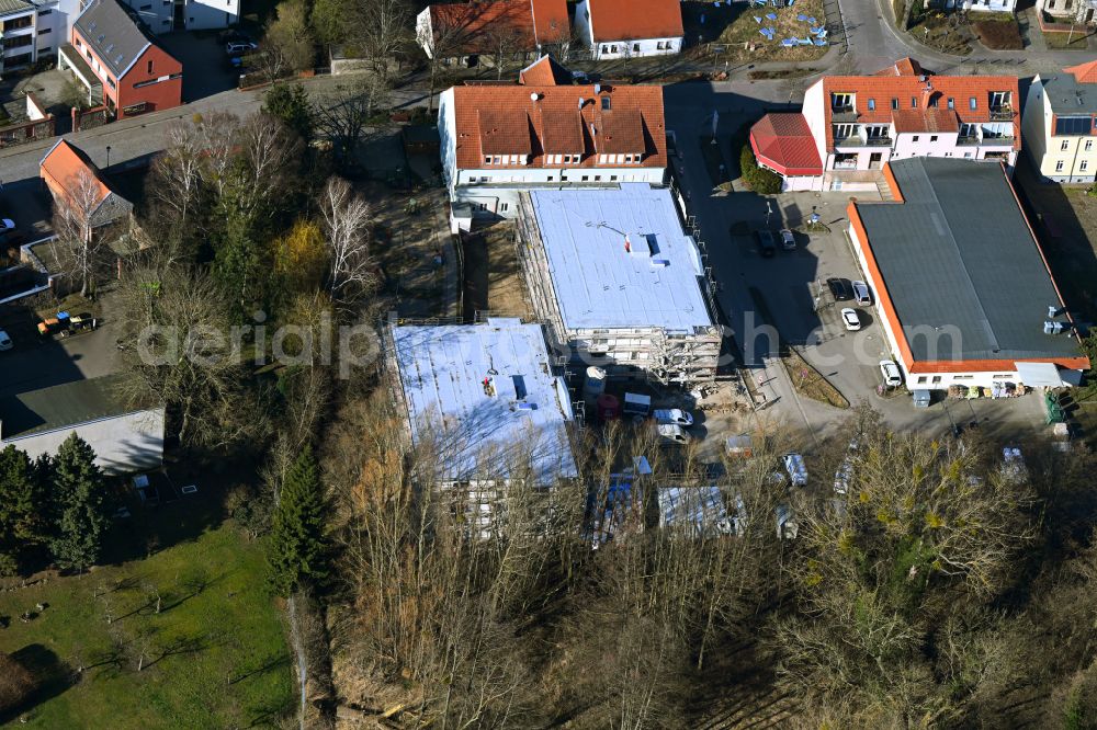 Aerial photograph Werneuchen - Construction site from the construction of a senior and age-appropriate residential complex on street Breite Strasse in Werneuchen in the state Brandenburg, Germany