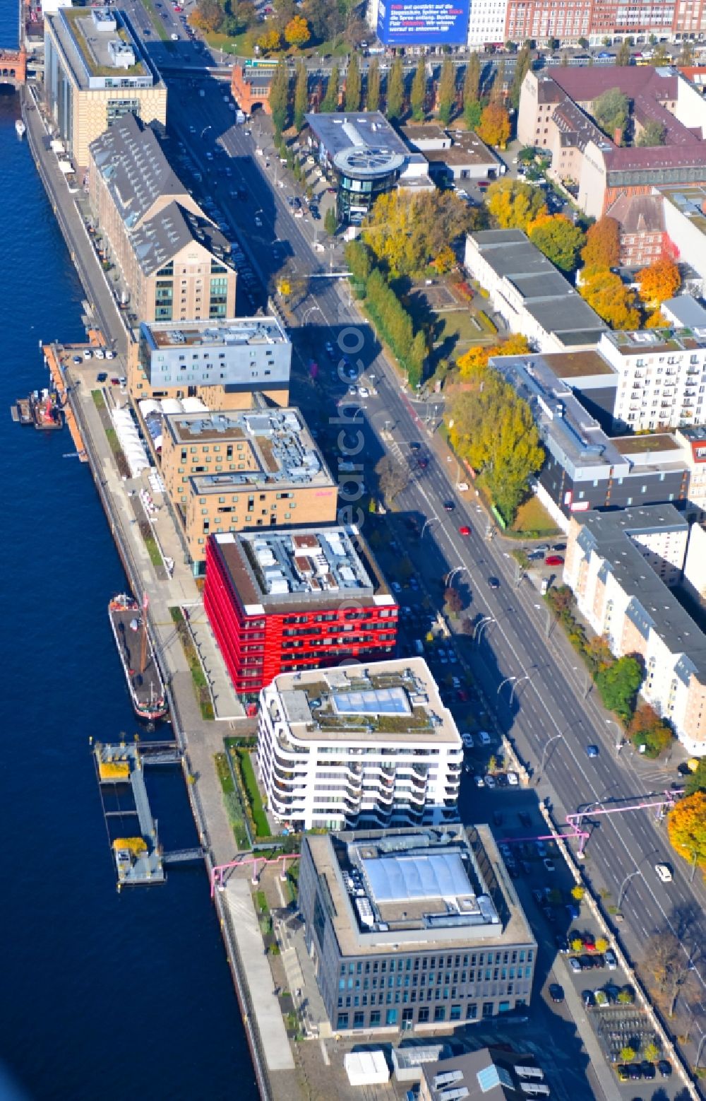 Berlin from above - Construction site of the new multi-family residential and apartment building complex The White on East harbour on the Northern shore of the Spree in Berlin in Germany