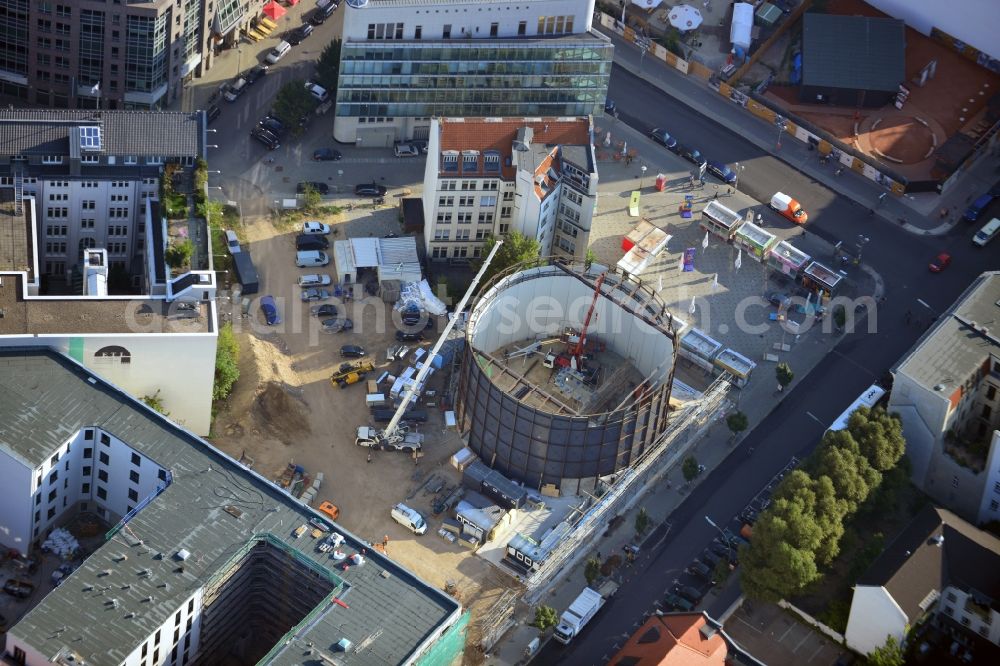 Berlin from above - View at the construction site of the new building Asisi-Panometer at the Friedrichstrasse in the district Mitte in Berlin. The Panometer is a project of the artist Yadegar Asisi and shows a panoramic view through an compressed artistic look at his panoramic image The Wall about the divided Berlin during the Cold War. Responsible for the architecture is the architect office Behzadi + Partner Architekten BDA established in Leipzig 