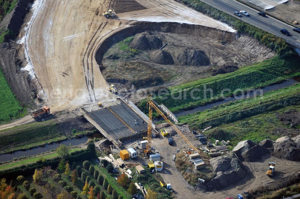 Aerial photograph Achern - Baustelle Autobahn A 5 bei Achern für einen sechsstreifigen Ausbau durch das Wolfgang Gerbere Konsortium Via Solutions Südwest. Bauausführung erfolgt durch die Arbeitsgemeinschaft / ARGE VCS BAB A5, ein Zusammenschluß der Firmen EUROVIA, F. Kirchhoff Straßenbau und Reif Bauunternehmung. Hier die Anschlussstelle AS Achern Construction area at the freeway / motorway A 5 for a 6-streaky removal.