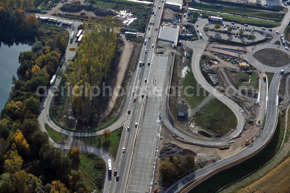 Aerial image Achern - Baustelle Autobahn A 5 bei Achern für einen sechsstreifigen Ausbau durch das Wolfgang Gerbere Konsortium Via Solutions Südwest. Bauausführung erfolgt durch die Arbeitsgemeinschaft / ARGE VCS BAB A5, ein Zusammenschluß der Firmen EUROVIA, F. Kirchhoff Straßenbau und Reif Bauunternehmung. Hier die Anschlussstelle AS Achern Construction area at the freeway / motorway A 5 for a 6-streaky removal.