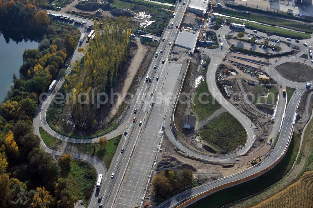 Aerial photograph Achern - Baustelle Autobahn A 5 bei Achern für einen sechsstreifigen Ausbau durch das Wolfgang Gerbere Konsortium Via Solutions Südwest. Bauausführung erfolgt durch die Arbeitsgemeinschaft / ARGE VCS BAB A5, ein Zusammenschluß der Firmen EUROVIA, F. Kirchhoff Straßenbau und Reif Bauunternehmung. Hier die Anschlussstelle AS Achern Construction area at the freeway / motorway A 5 for a 6-streaky removal.