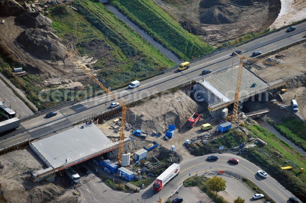 Achern from the bird's eye view: Baustelle Autobahn A 5 bei Achern für einen sechsstreifigen Ausbau durch das Wolfgang Gerbere Konsortium Via Solutions Südwest. Bauausführung erfolgt durch die Arbeitsgemeinschaft / ARGE VCS BAB A5, ein Zusammenschluß der Firmen EUROVIA, F. Kirchhoff Straßenbau und Reif Bauunternehmung. Hier die Anschlussstelle AS Achern Construction area at the freeway / motorway A 5 for a 6-streaky removal.