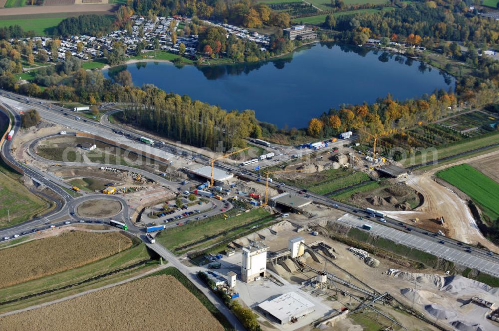 Achern from the bird's eye view: Baustelle Autobahn A 5 bei Achern für einen sechsstreifigen Ausbau durch das Wolfgang Gerbere Konsortium Via Solutions Südwest. Bauausführung erfolgt durch die Arbeitsgemeinschaft / ARGE VCS BAB A5, ein Zusammenschluß der Firmen EUROVIA, F. Kirchhoff Straßenbau und Reif Bauunternehmung. Hier die Anschlussstelle AS Achern Construction area at the freeway / motorway A 5 for a 6-streaky removal.