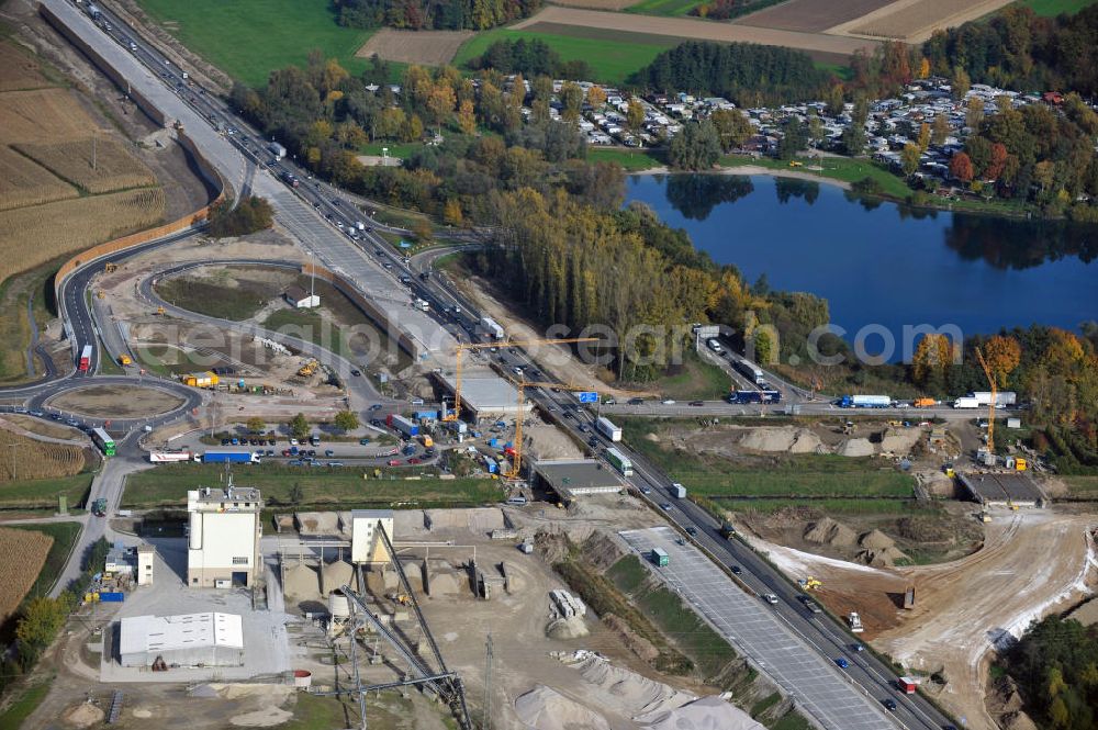 Achern from the bird's eye view: Baustelle Autobahn A 5 bei Achern für einen sechsstreifigen Ausbau durch das Wolfgang Gerbere Konsortium Via Solutions Südwest. Bauausführung erfolgt durch die Arbeitsgemeinschaft / ARGE VCS BAB A5, ein Zusammenschluß der Firmen EUROVIA, F. Kirchhoff Straßenbau und Reif Bauunternehmung. Hier die Anschlussstelle AS Achern Construction area at the freeway / motorway A 5 for a 6-streaky removal.