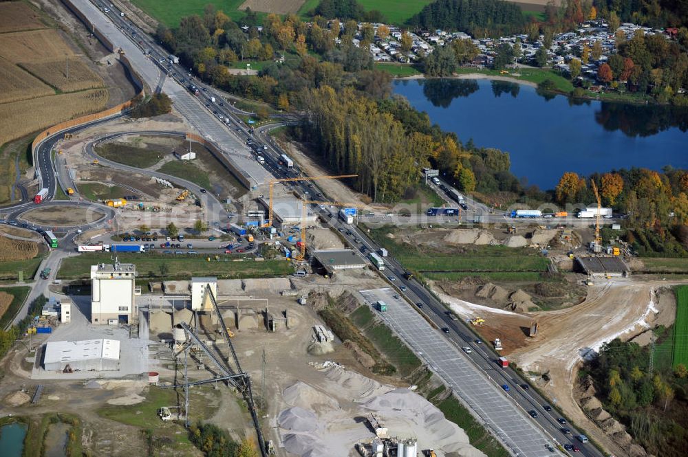 Aerial image Achern - Baustelle Autobahn A 5 bei Achern für einen sechsstreifigen Ausbau durch das Wolfgang Gerbere Konsortium Via Solutions Südwest. Bauausführung erfolgt durch die Arbeitsgemeinschaft / ARGE VCS BAB A5, ein Zusammenschluß der Firmen EUROVIA, F. Kirchhoff Straßenbau und Reif Bauunternehmung. Hier die Anschlussstelle AS Achern Construction area at the freeway / motorway A 5 for a 6-streaky removal.