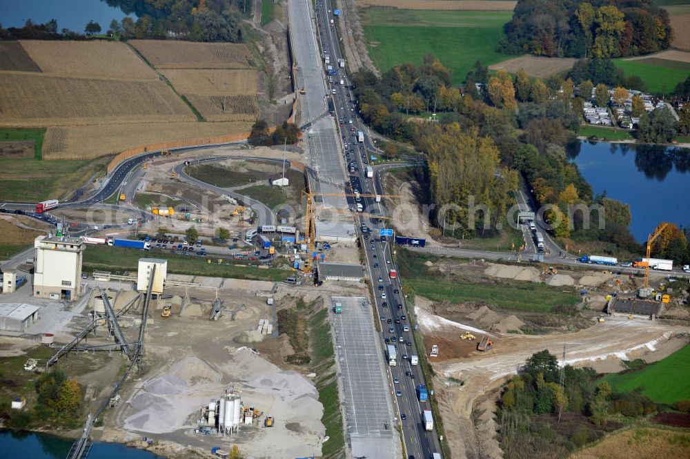 Aerial photograph Achern - Baustelle Autobahn A 5 bei Achern für einen sechsstreifigen Ausbau durch das Wolfgang Gerbere Konsortium Via Solutions Südwest. Bauausführung erfolgt durch die Arbeitsgemeinschaft / ARGE VCS BAB A5, ein Zusammenschluß der Firmen EUROVIA, F. Kirchhoff Straßenbau und Reif Bauunternehmung. Hier die Anschlussstelle AS Achern Construction area at the freeway / motorway A 5 for a 6-streaky removal.