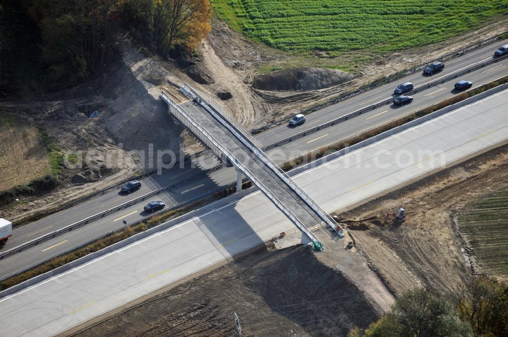 Achern from the bird's eye view: Baustelle Autobahn A 5 bei Achern für einen sechsstreifigen Ausbau durch das Wolfgang Gerbere Konsortium Via Solutions Südwest. Bauausführung erfolgt durch die Arbeitsgemeinschaft / ARGE VCS BAB A5, ein Zusammenschluß der Firmen EUROVIA, F. Kirchhoff Straßenbau und Reif Bauunternehmung. Hier die Anschlussstelle AS Achern Construction area at the freeway / motorway A 5 for a 6-streaky removal.