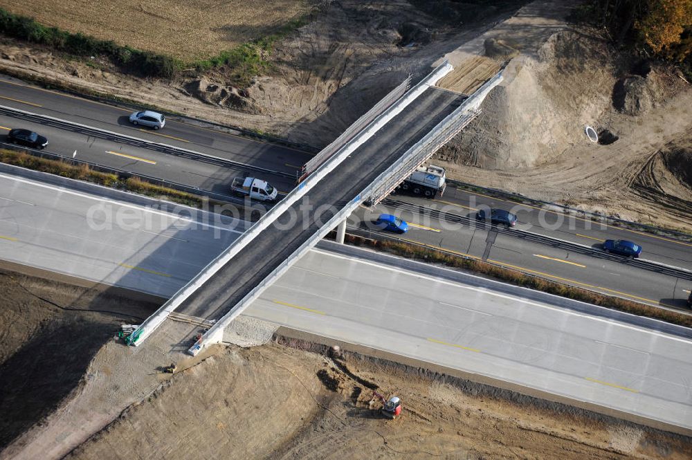 Aerial photograph Achern - Baustelle Autobahn A 5 bei Achern für einen sechsstreifigen Ausbau durch das Wolfgang Gerbere Konsortium Via Solutions Südwest. Bauausführung erfolgt durch die Arbeitsgemeinschaft / ARGE VCS BAB A5, ein Zusammenschluß der Firmen EUROVIA, F. Kirchhoff Straßenbau und Reif Bauunternehmung. Hier die Anschlussstelle AS Achern Construction area at the freeway / motorway A 5 for a 6-streaky removal.