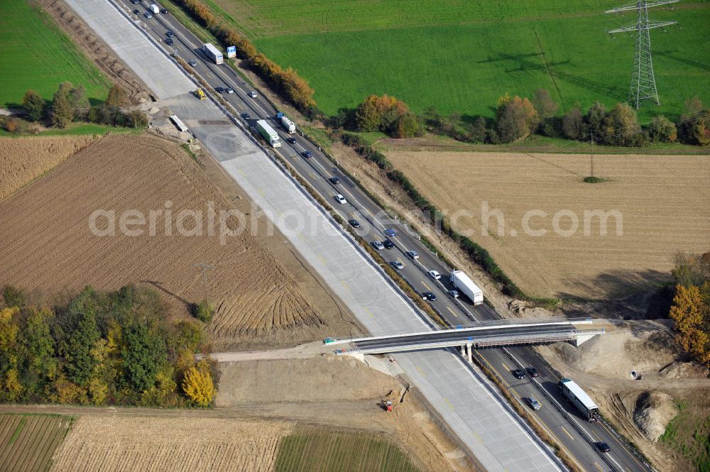 Aerial photograph Achern - Baustelle Autobahn A 5 bei Achern für einen sechsstreifigen Ausbau durch das Wolfgang Gerbere Konsortium Via Solutions Südwest. Bauausführung erfolgt durch die Arbeitsgemeinschaft / ARGE VCS BAB A5, ein Zusammenschluß der Firmen EUROVIA, F. Kirchhoff Straßenbau und Reif Bauunternehmung. Hier die Anschlussstelle AS Achern Construction area at the freeway / motorway A 5 for a 6-streaky removal.