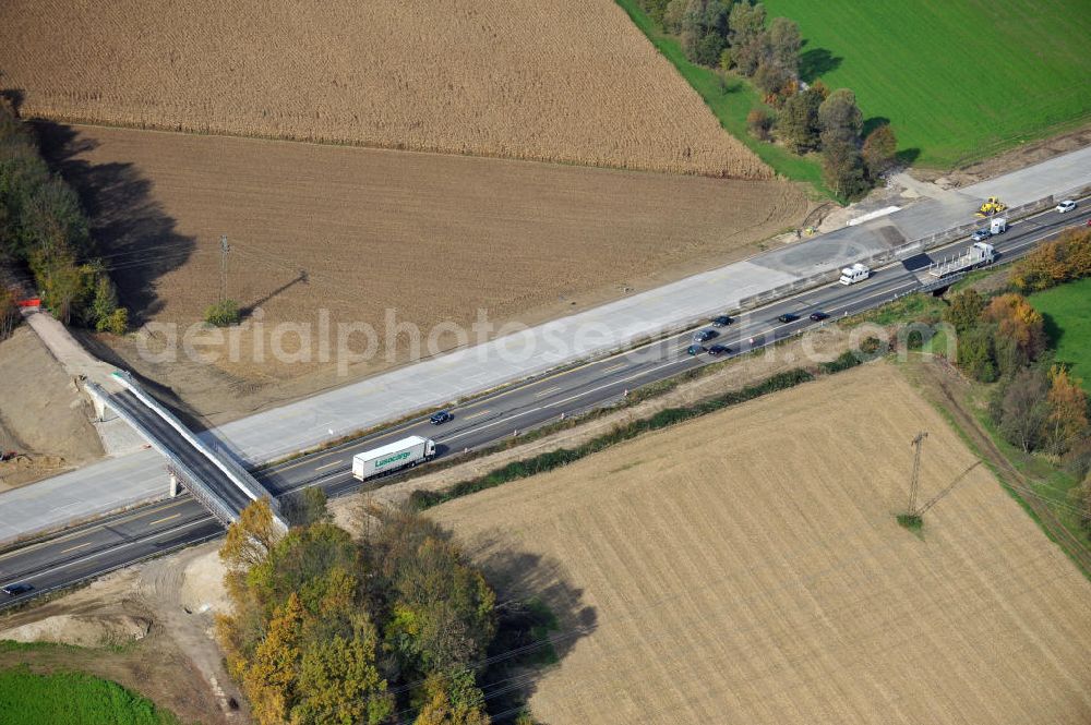 Aerial photograph Achern - Baustelle Autobahn A 5 bei Achern für einen sechsstreifigen Ausbau durch das Wolfgang Gerbere Konsortium Via Solutions Südwest. Bauausführung erfolgt durch die Arbeitsgemeinschaft / ARGE VCS BAB A5, ein Zusammenschluß der Firmen EUROVIA, F. Kirchhoff Straßenbau und Reif Bauunternehmung. Hier die Anschlussstelle AS Achern Construction area at the freeway / motorway A 5 for a 6-streaky removal.