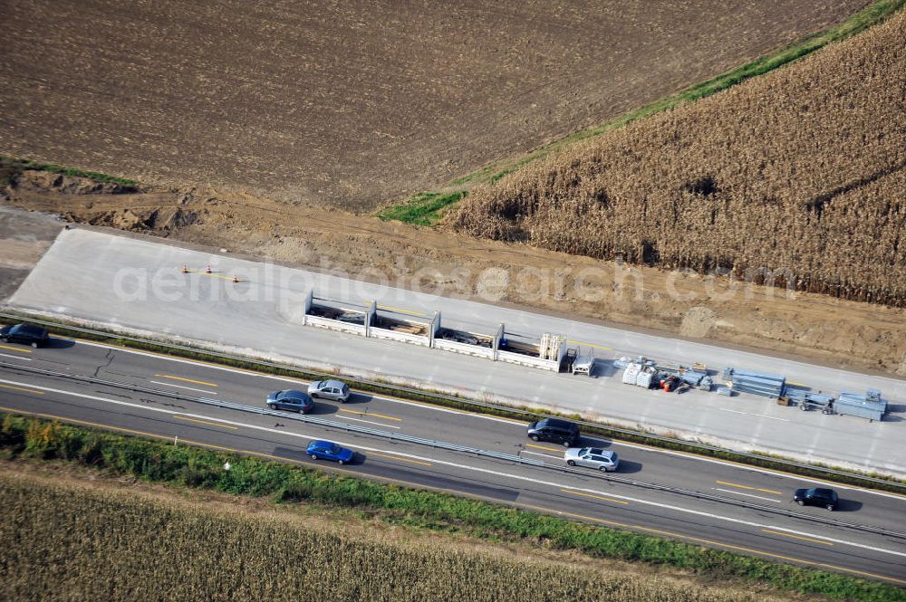 Achern from the bird's eye view: Baustelle Autobahn A 5 bei Achern für einen sechsstreifigen Ausbau durch das Wolfgang Gerbere Konsortium Via Solutions Südwest. Bauausführung erfolgt durch die Arbeitsgemeinschaft / ARGE VCS BAB A5, ein Zusammenschluß der Firmen EUROVIA, F. Kirchhoff Straßenbau und Reif Bauunternehmung. Hier die Anschlussstelle AS Achern Construction area at the freeway / motorway A 5 for a 6-streaky removal.