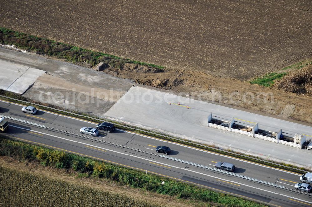 Aerial image Achern - Baustelle Autobahn A 5 bei Achern für einen sechsstreifigen Ausbau durch das Wolfgang Gerbere Konsortium Via Solutions Südwest. Bauausführung erfolgt durch die Arbeitsgemeinschaft / ARGE VCS BAB A5, ein Zusammenschluß der Firmen EUROVIA, F. Kirchhoff Straßenbau und Reif Bauunternehmung. Hier die Anschlussstelle AS Achern Construction area at the freeway / motorway A 5 for a 6-streaky removal.