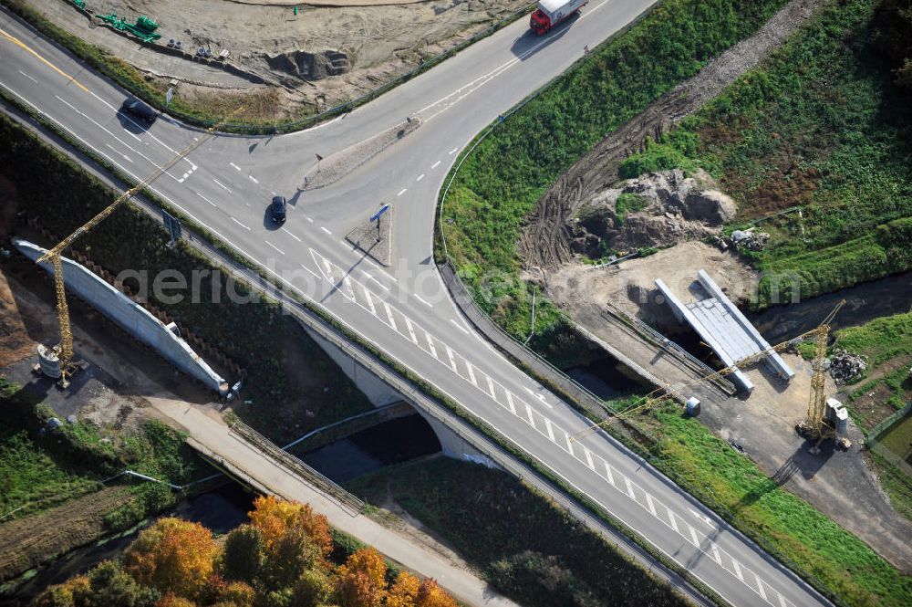 Aerial photograph Bühl-Oberbruch - Baustelle Autobahn A 5 bei Oberbruch für einen sechsstreifigen Ausbau durch das Wolfgang Gerbere Konsortium Via Solutions Südwest. Bauausführung erfolgt durch die Arbeitsgemeinschaft / ARGE VCS BAB A5, ein Zusammenschluß der Firmen EUROVIA, F. Kirchhoff Straßenbau und Reif Bauunternehmung. Construction area at the freeway / motorway A 5 for a 6-streaky removal.