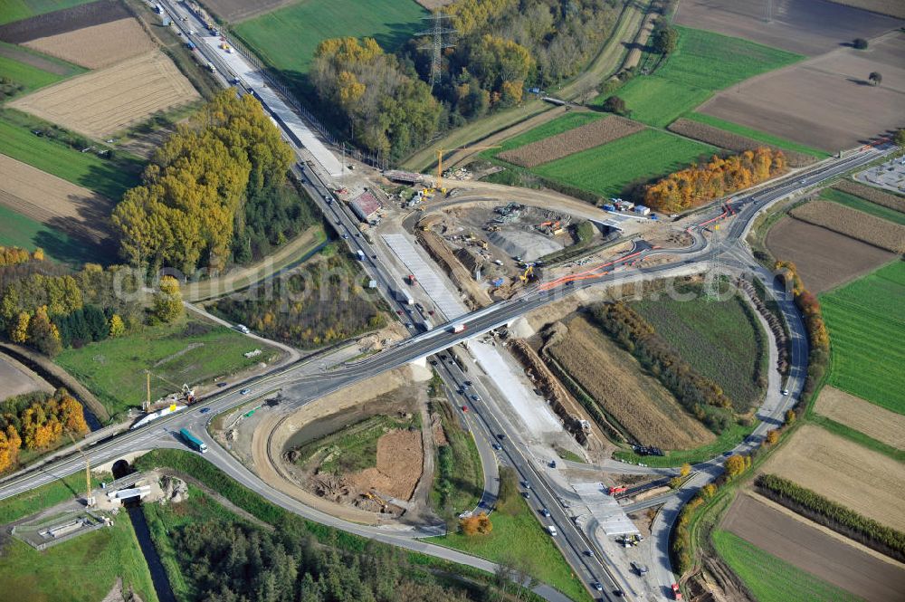 Aerial photograph Bühl-Oberbruch - Baustelle Autobahn A 5 bei Oberbruch für einen sechsstreifigen Ausbau durch das Wolfgang Gerbere Konsortium Via Solutions Südwest. Bauausführung erfolgt durch die Arbeitsgemeinschaft / ARGE VCS BAB A5, ein Zusammenschluß der Firmen EUROVIA, F. Kirchhoff Straßenbau und Reif Bauunternehmung. Construction area at the freeway / motorway A 5 for a 6-streaky removal.