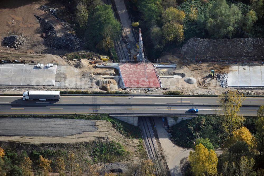 Aerial photograph Bühl-Oberbruch - Baustelle Autobahn A 5 bei Oberbruch für einen sechsstreifigen Ausbau durch das Wolfgang Gerbere Konsortium Via Solutions Südwest. Bauausführung erfolgt durch die Arbeitsgemeinschaft / ARGE VCS BAB A5, ein Zusammenschluß der Firmen EUROVIA, F. Kirchhoff Straßenbau und Reif Bauunternehmung. Construction area at the freeway / motorway A 5 for a 6-streaky removal.