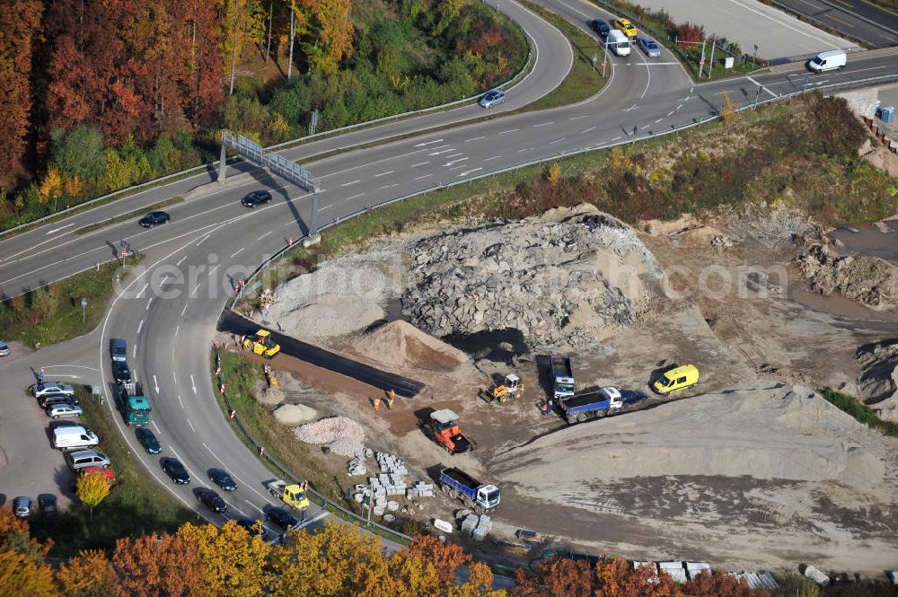 Aerial photograph Offenburg - Baustelle Autobahn A 5 bei Offenburg für einen sechsstreifigen Ausbau durch das Wolfgang Gerbere Konsortium Via Solutions Südwest. Bauausführung erfolgt durch die Arbeitsgemeinschaft / ARGE VCS BAB A5, ein Zusammenschluß der Firmen EUROVIA, F. Kirchhoff Straßenbau und Reif Bauunternehmung. Construction area at the freeway / motorway A 5 for a 6-streaky removal.