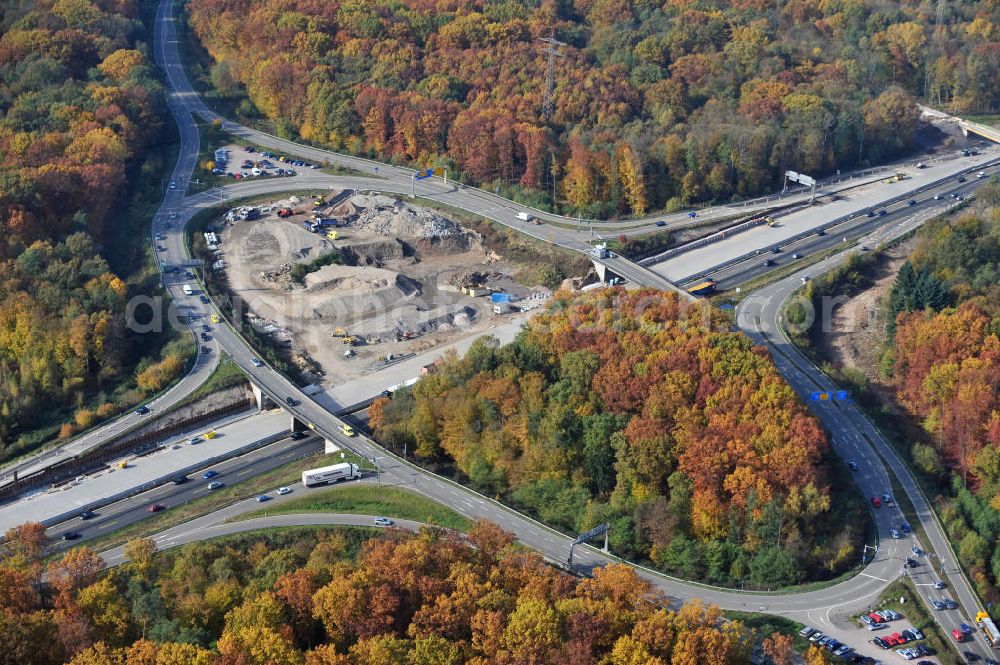 Aerial photograph Offenburg - Baustelle Autobahn A 5 bei Offenburg für einen sechsstreifigen Ausbau durch das Wolfgang Gerbere Konsortium Via Solutions Südwest. Bauausführung erfolgt durch die Arbeitsgemeinschaft / ARGE VCS BAB A5, ein Zusammenschluß der Firmen EUROVIA, F. Kirchhoff Straßenbau und Reif Bauunternehmung. Construction area at the freeway / motorway A 5 for a 6-streaky removal.