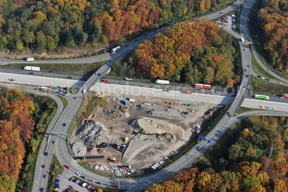 Offenburg from the bird's eye view: Baustelle Autobahn A 5 bei Offenburg für einen sechsstreifigen Ausbau durch das Wolfgang Gerbere Konsortium Via Solutions Südwest. Bauausführung erfolgt durch die Arbeitsgemeinschaft / ARGE VCS BAB A5, ein Zusammenschluß der Firmen EUROVIA, F. Kirchhoff Straßenbau und Reif Bauunternehmung. Construction area at the freeway / motorway A 5 for a 6-streaky removal.