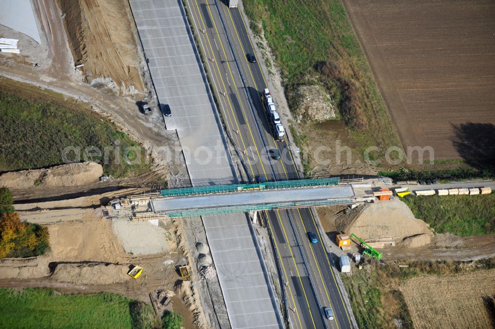 Weitenung from the bird's eye view: Baustelle Autobahn A 5 bei Weitenung für einen sechsstreifigen Ausbau durch das Wolfgang Gerbere Konsortium Via Solutions Südwest. Bauausführung erfolgt durch die Arbeitsgemeinschaft / ARGE VCS BAB A5, ein Zusammenschluß der Firmen EUROVIA, F. Kirchhoff Straßenbau und Reif Bauunternehmung. Construction area at the freeway / motorway A 5 for a 6-streaky removal.