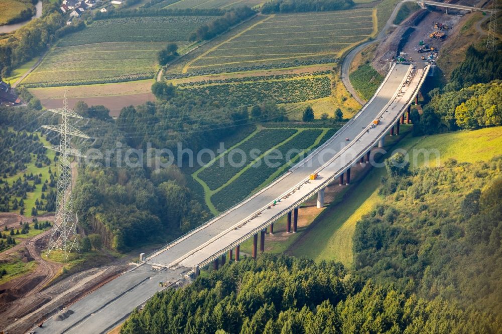 Aerial image Bestwig - Construction site for the new building of Routing and traffic lanes over the highway bridge in the motorway A 46 in Bestwig in the state North Rhine-Westphalia, Germany