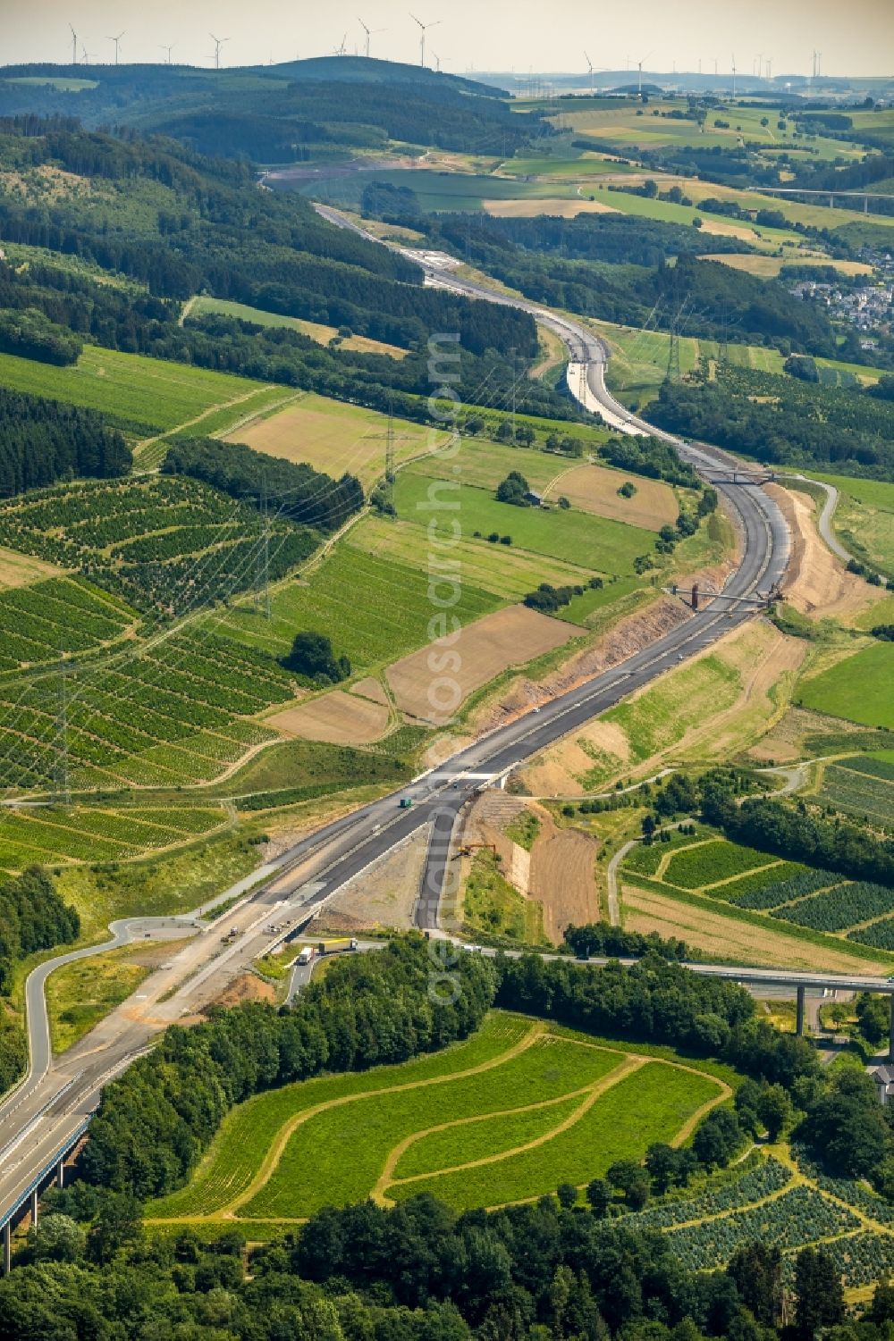 Bestwig from above - Construction site for the new building of Routing and traffic lanes over the highway bridge in the motorway A 46 in Bestwig in the state North Rhine-Westphalia, Germany