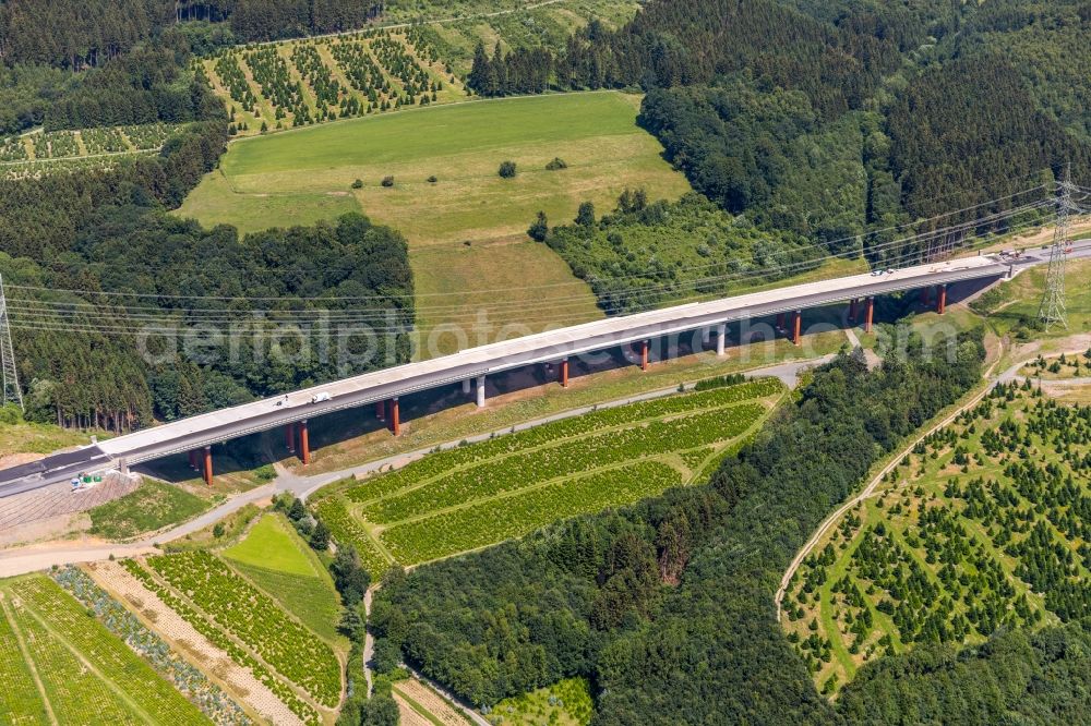 Aerial photograph Bestwig - Construction site for the new building of Routing and traffic lanes over the highway bridge in the motorway A 46 in Bestwig in the state North Rhine-Westphalia, Germany