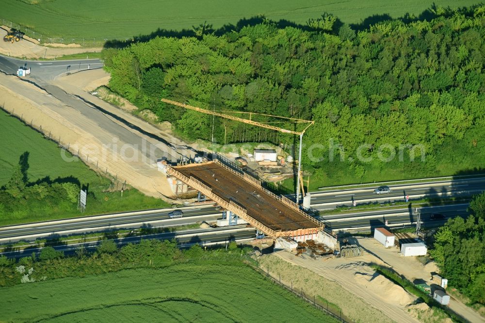 Glasewitz from the bird's eye view: Construction site for the new building of Routing and traffic lanes over the highway bridge in the motorway A 19 in Glasewitz in the state Mecklenburg - Western Pomerania, Germany