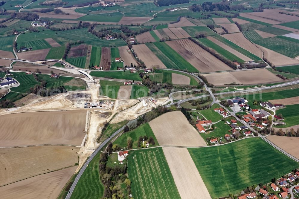 Heldenstein from the bird's eye view: Construction site for the new building of Routing and traffic lanes over the highway bridge in the motorway A 49 on Isentaltrasse in Heldenstein in the state Bavaria