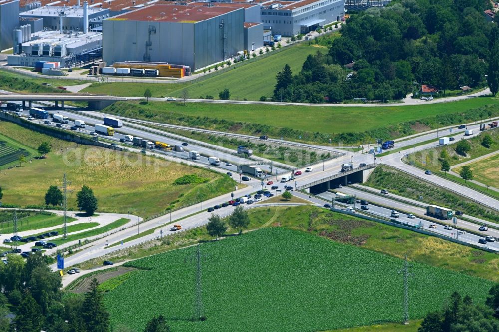 München from the bird's eye view: Construction site for the new building of Routing and traffic lanes over the highway bridge in the motorway A 99 - Lochhausener Strasse in the district Lochhausen in Munich in the state Bavaria, Germany