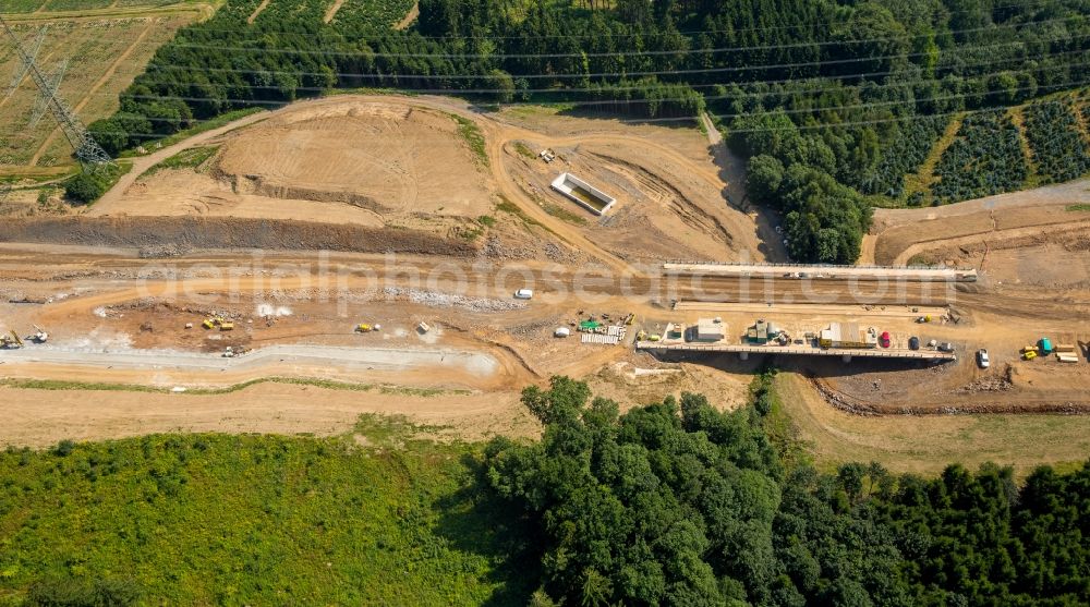 Meschede from above - Construction site for the new building of Routing and traffic lanes over the highway bridge in the motorway A46 in Meschede in Sauerland in the state North Rhine-Westphalia