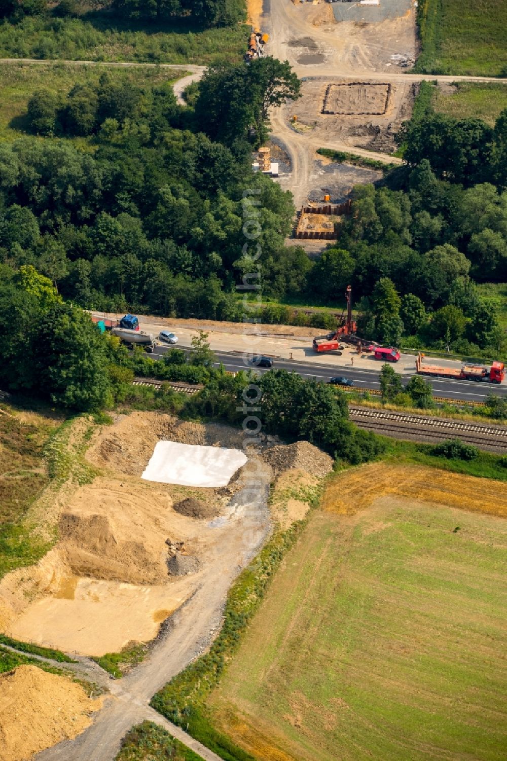 Meschede from the bird's eye view: Construction site for the new building of Routing and traffic lanes over the highway bridge in the motorway A46 in Meschede in Sauerland in the state North Rhine-Westphalia