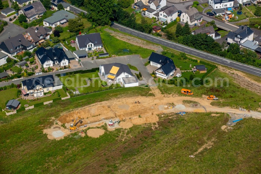 Aerial photograph Meschede - Construction site for the new building of Routing and traffic lanes over the highway bridge in the motorway A46 in Meschede in Sauerland in the state North Rhine-Westphalia