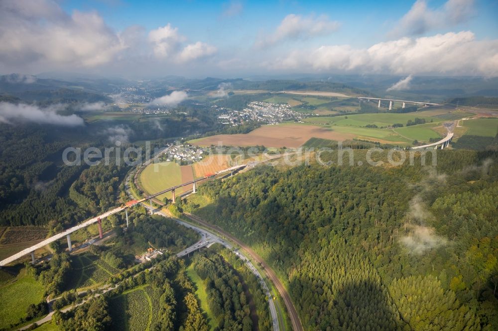 Bestwig from the bird's eye view: Construction site for the new building of Routing and traffic lanes over the highway bridge in the motorway A A 46 - B480n Neue Ruhrtalbruecke Bermecke in Bestwig in the state North Rhine-Westphalia