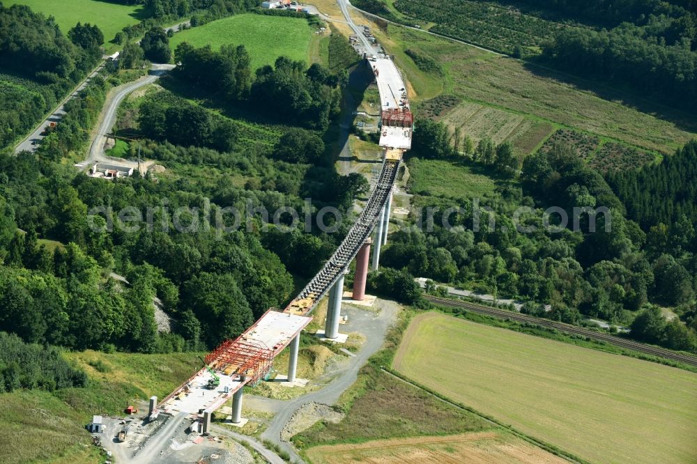 Olsberg from above - Construction site for the new building of Routing and traffic lanes over the highway bridge in the motorway A 46n in the district Bigge in Olsberg in the state North Rhine-Westphalia, Germany