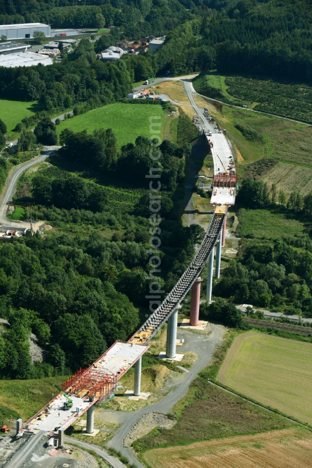 Olsberg from the bird's eye view: Construction site for the new building of Routing and traffic lanes over the highway bridge in the motorway A 46n in the district Bigge in Olsberg in the state North Rhine-Westphalia, Germany