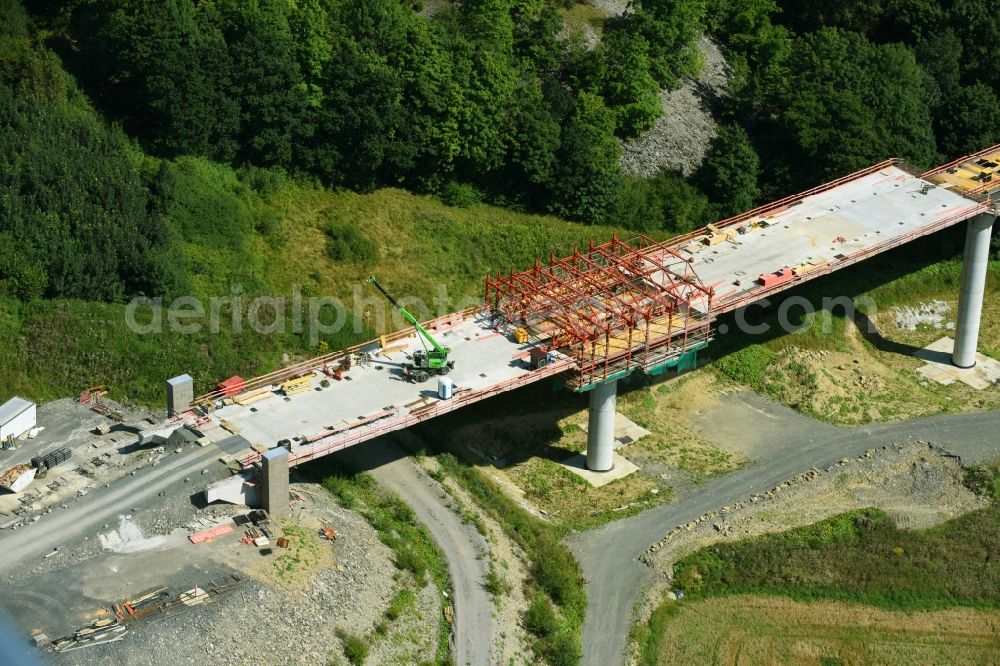 Aerial photograph Olsberg - Construction site for the new building of Routing and traffic lanes over the highway bridge in the motorway A 46n in the district Bigge in Olsberg in the state North Rhine-Westphalia, Germany