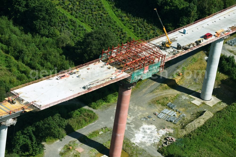 Olsberg from above - Construction site for the new building of Routing and traffic lanes over the highway bridge in the motorway A 46n in the district Bigge in Olsberg in the state North Rhine-Westphalia, Germany